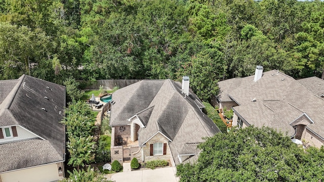 47 Dresden Pl, The Woodlands, TX 77382 - view of subject property featuring a heavily wooded area