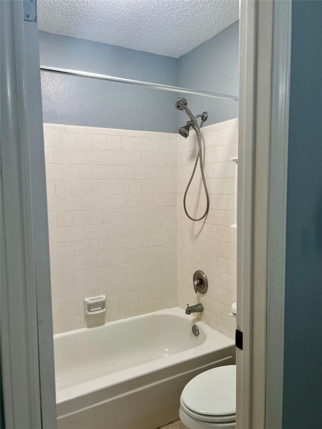 667 E Country Grove Cir, Pearland, TX 77584 - full bathroom featuring a textured ceiling and tub / shower combination