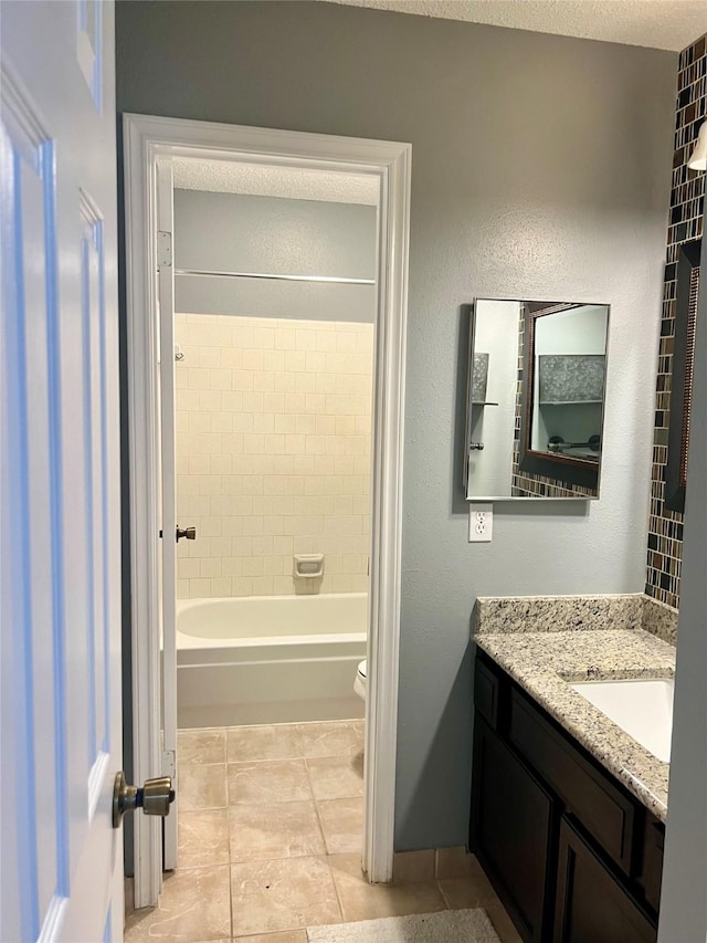 667 E Country Grove Cir, Pearland, TX 77584 - full bathroom featuring vanity, tile patterned floors, and shower / bath combination
