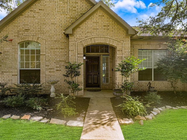 11702 Park Cedar Ct, Tomball, TX 77377 - doorway to property featuring brick siding