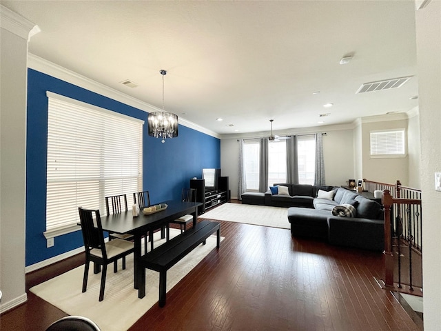 3207 Clearview Cir, Houston, TX 77025 - dining area featuring a chandelier, dark wood-type flooring, crown molding, and recessed lighting