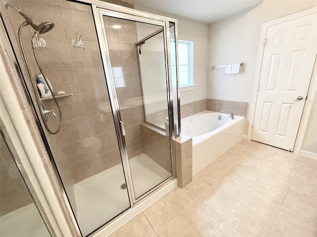 3207 Clearview Cir, Houston, TX 77025 - full bathroom with a garden tub, a stall shower, and tile patterned floors