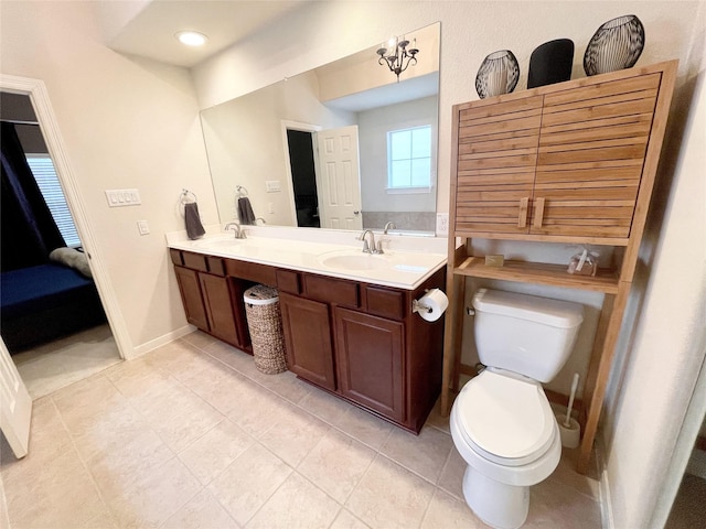 3207 Clearview Cir, Houston, TX 77025 - full bath featuring double vanity, tile patterned floors, and connected bathroom