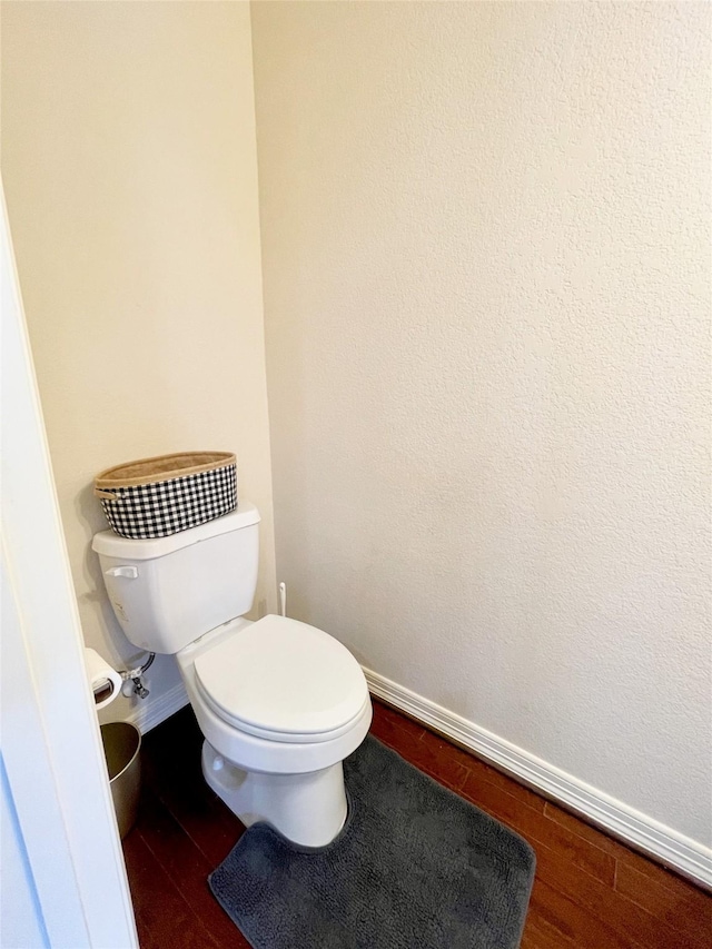 3207 Clearview Cir, Houston, TX 77025 - bathroom featuring wood finished floors and toilet