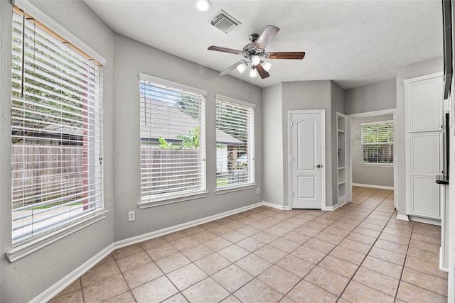 17518 Cypress Laurel St, Houston, TX 77095 - unfurnished bedroom with light tile patterned floors, a ceiling fan, and recessed lighting