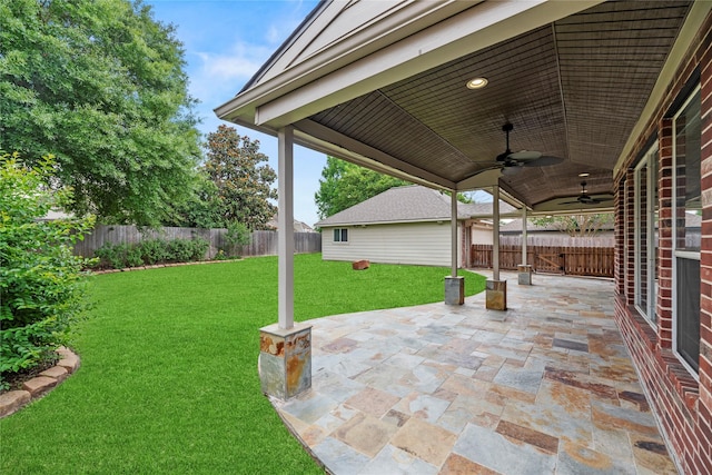 17518 Cypress Laurel St, Houston, TX 77095 - fenced backyard featuring a ceiling fan and a patio