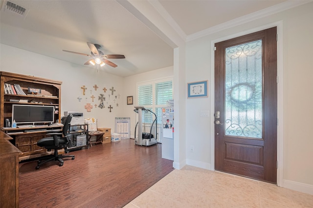 3903 Grand Fir Ct, Richmond, TX 77469 - entrance foyer featuring ceiling fan, ornamental molding, and wood finished floors