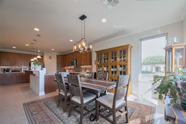3903 Grand Fir Ct, Richmond, TX 77469 - dining space with a chandelier, recessed lighting, light tile patterned floors, and ornamental molding