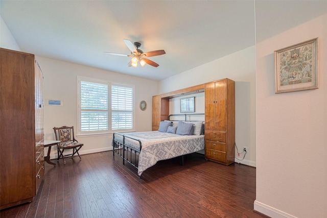 3903 Grand Fir Ct, Richmond, TX 77469 - bedroom with multiple windows, dark wood-style floors, and a ceiling fan