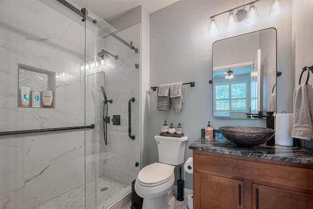 3903 Grand Fir Ct, Richmond, TX 77469 - bathroom with vanity, a marble finish shower, and a ceiling fan