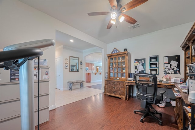 3903 Grand Fir Ct, Richmond, TX 77469 - office space featuring a ceiling fan, wood finished floors, arched walkways, and recessed lighting