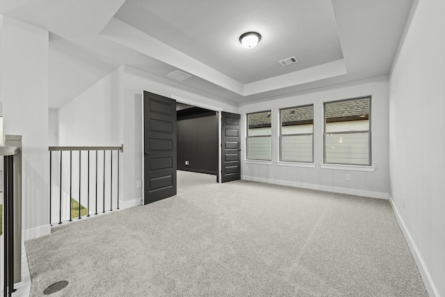 3240 Stingray Cove Dr, Katy, TX 77493 - unfurnished room with a raised ceiling and carpet floors