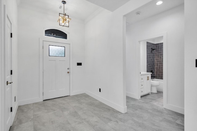 3220 Saint James Blvd, Beaumont, TX 77705 - foyer with ornamental molding, a chandelier, and recessed lighting
