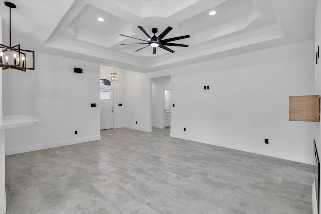 3220 Saint James Blvd, Beaumont, TX 77705 - unfurnished room with a chandelier, a raised ceiling, a ceiling fan, recessed lighting, and coffered ceiling