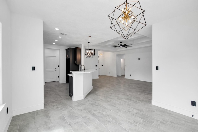 3220 Saint James Blvd, Beaumont, TX 77705 - unfurnished living room with a chandelier, recessed lighting, and a ceiling fan