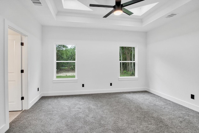 3220 Saint James Blvd, Beaumont, TX 77705 - empty room featuring a raised ceiling, carpet flooring, ceiling fan, and ornamental molding