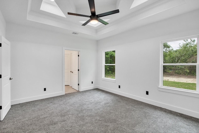 3220 Saint James Blvd, Beaumont, TX 77705 - carpeted spare room with a raised ceiling, healthy amount of natural light, and ceiling fan