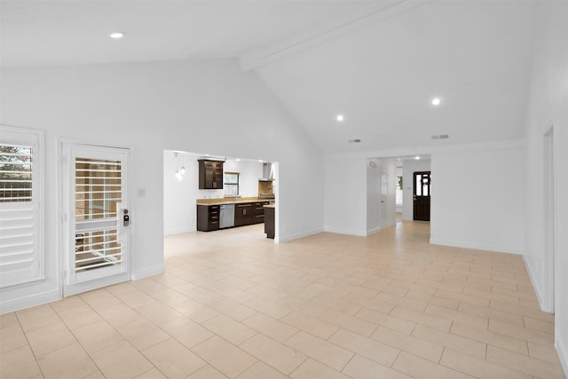 310 W Fair Harbor Ln, Houston, TX 77079 - unfurnished living room featuring high vaulted ceiling, beamed ceiling, and recessed lighting