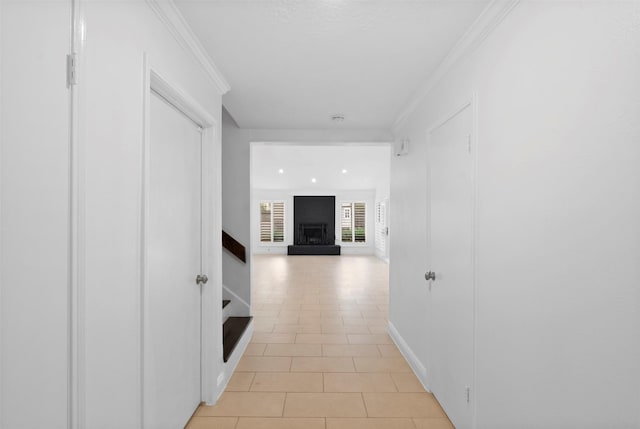 310 W Fair Harbor Ln, Houston, TX 77079 - hallway with light tile patterned floors and ornamental molding