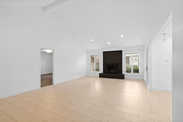 310 W Fair Harbor Ln, Houston, TX 77079 - unfurnished living room featuring high vaulted ceiling, beamed ceiling, recessed lighting, and a fireplace with raised hearth