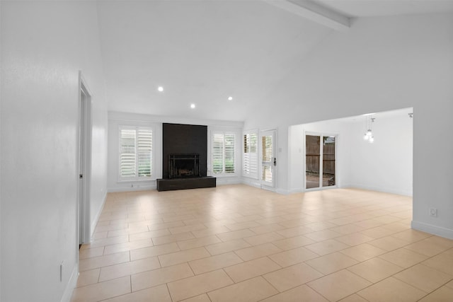 310 W Fair Harbor Ln, Houston, TX 77079 - unfurnished living room with beamed ceiling, high vaulted ceiling, a fireplace with raised hearth, and recessed lighting