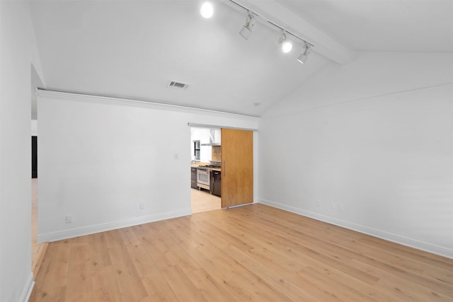 310 W Fair Harbor Ln, Houston, TX 77079 - unfurnished living room with rail lighting and light wood-style flooring