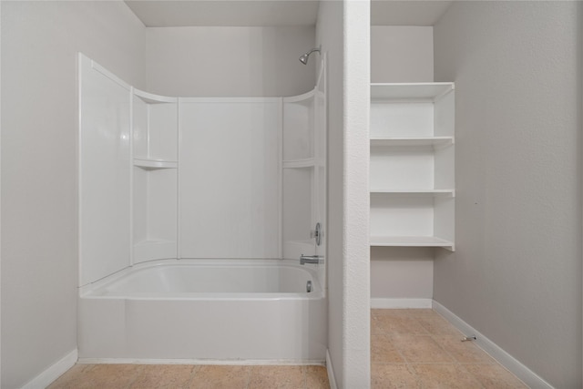 9826 Orchid Spring Ln, Houston, TX 77044 - bathroom with  shower combination and baseboards