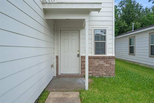 9826 Orchid Spring Ln, Houston, TX 77044 - doorway to property featuring a yard