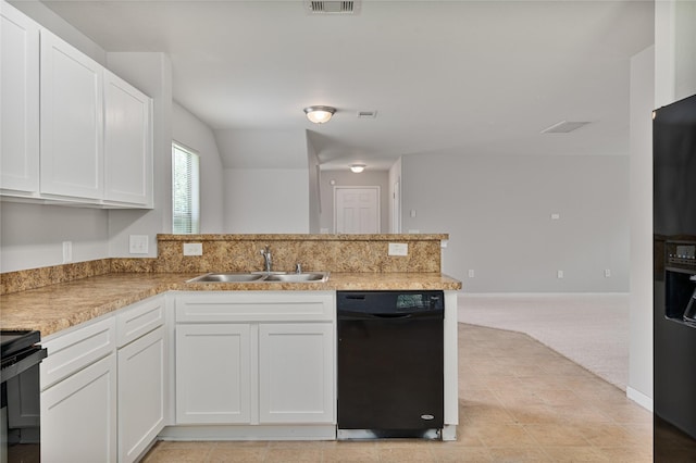 9826 Orchid Spring Ln, Houston, TX 77044 - kitchen featuring dishwasher, a peninsula, light colored carpet, and white cabinetry