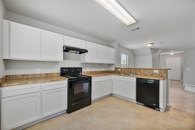 9826 Orchid Spring Ln, Houston, TX 77044 - kitchen with black appliances, under cabinet range hood, a peninsula, white cabinetry, and light stone countertops