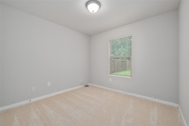 9826 Orchid Spring Ln, Houston, TX 77044 - carpeted spare room featuring baseboards