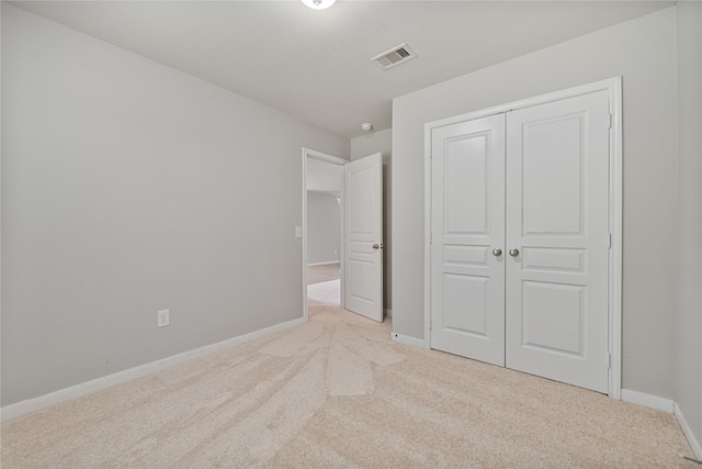 9826 Orchid Spring Ln, Houston, TX 77044 - unfurnished bedroom with carpet floors and a closet