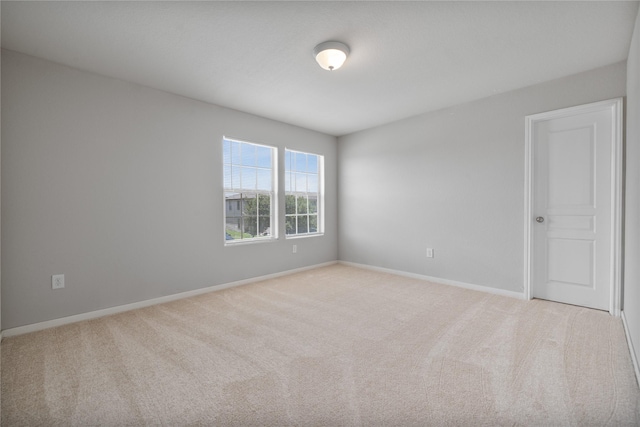 9826 Orchid Spring Ln, Houston, TX 77044 - spare room with light carpet