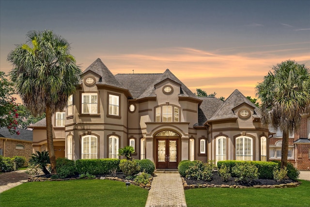 718 Marywood Chase, Houston, TX 77079 - french country inspired facade with french doors, stucco siding, a yard, and a shingled roof