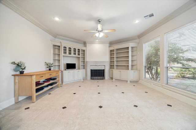 718 Marywood Chase, Houston, TX 77079 - unfurnished living room featuring ornamental molding, a high end fireplace, a ceiling fan, light tile patterned flooring, and recessed lighting