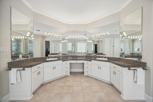 718 Marywood Chase, Houston, TX 77079 - bathroom featuring a chandelier, ornamental molding, vanity, and a walk in shower