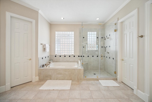 718 Marywood Chase, Houston, TX 77079 - bathroom featuring a bath, healthy amount of natural light, a shower stall, crown molding, and tile patterned flooring