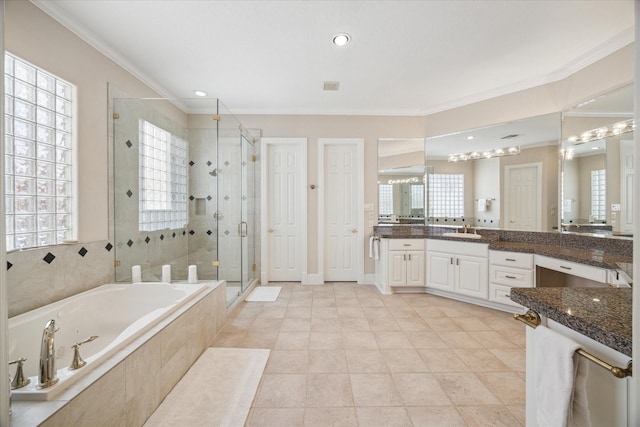 718 Marywood Chase, Houston, TX 77079 - bathroom with crown molding, a stall shower, a bath, healthy amount of natural light, and vanity