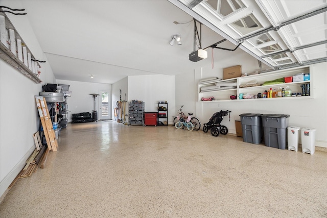 718 Marywood Chase, Houston, TX 77079 - garage featuring a garage door opener
