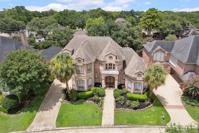 718 Marywood Chase, Houston, TX 77079 - view of front facade with stucco siding and a shingled roof