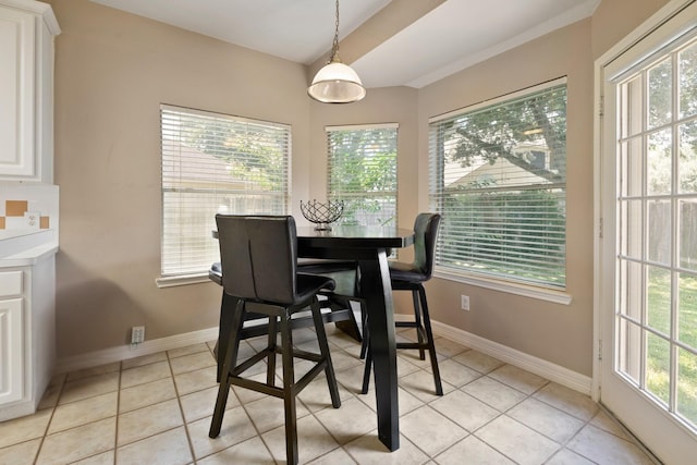 4146 S Webber Dr, Pearland, TX 77584 - dining room with healthy amount of natural light and light tile patterned floors