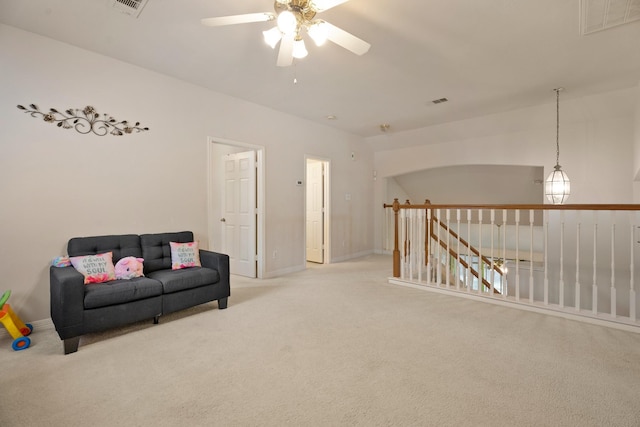 4146 S Webber Dr, Pearland, TX 77584 - sitting room featuring ceiling fan, carpet, and an upstairs landing