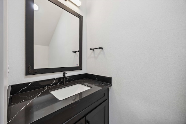 5711 Sudan St, Houston, TX 77020 - bathroom with vanity and lofted ceiling