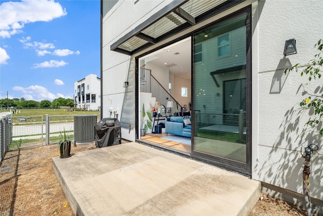 9809 Blissful Prairie Ln, Houston, TX 77080 - view of patio / terrace featuring stairway
