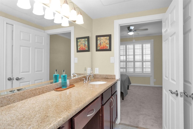 2700 Revere St Unit 147, Houston, TX 77098 - bathroom featuring vanity, ceiling fan, and ornamental molding