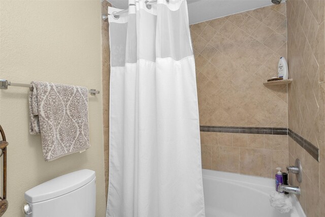 2700 Revere St Unit 147, Houston, TX 77098 - bathroom featuring shower / tub combo and toilet