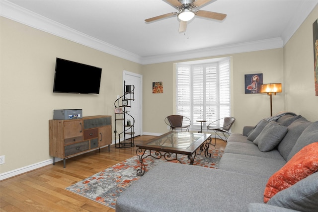 2700 Revere St Unit 147, Houston, TX 77098 - living room with ornamental molding, a ceiling fan, and wood finished floors