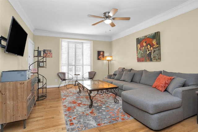 2700 Revere St Unit 147, Houston, TX 77098 - living room featuring ornamental molding, ceiling fan, and light wood-style flooring