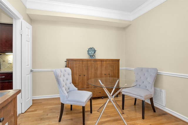 2700 Revere St Unit 147, Houston, TX 77098 - sitting room with light wood-style floors and ornamental molding