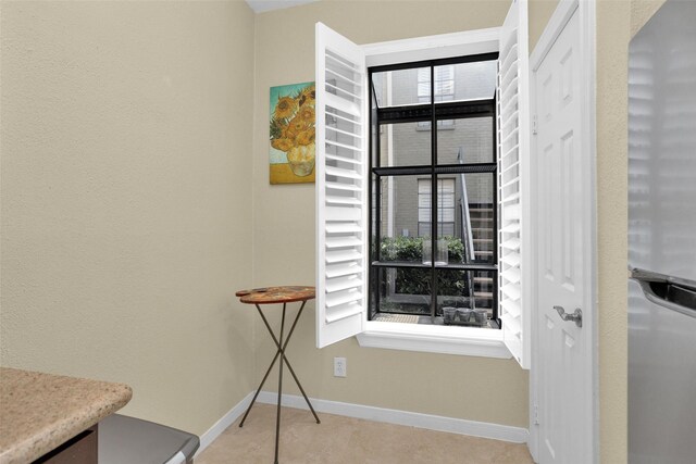 2700 Revere St Unit 147, Houston, TX 77098 - dining area featuring baseboards